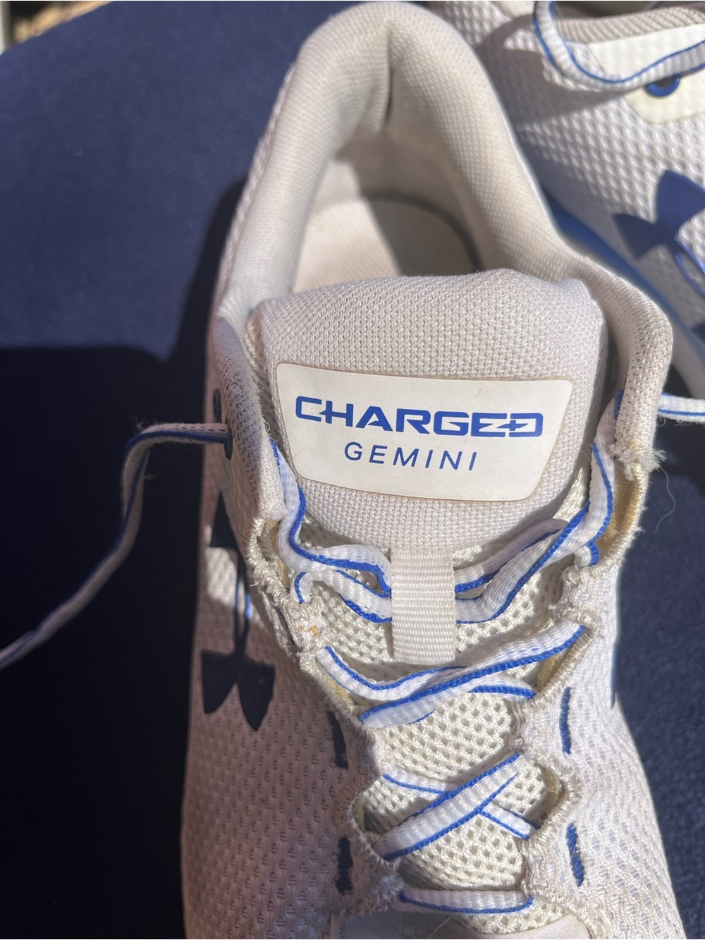 Under Armour White Mesh Running Shoes with Blue Accents